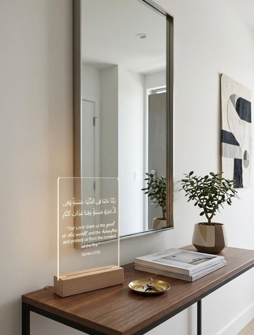 Modern interior with a wooden console table, mirror, and decorative items.