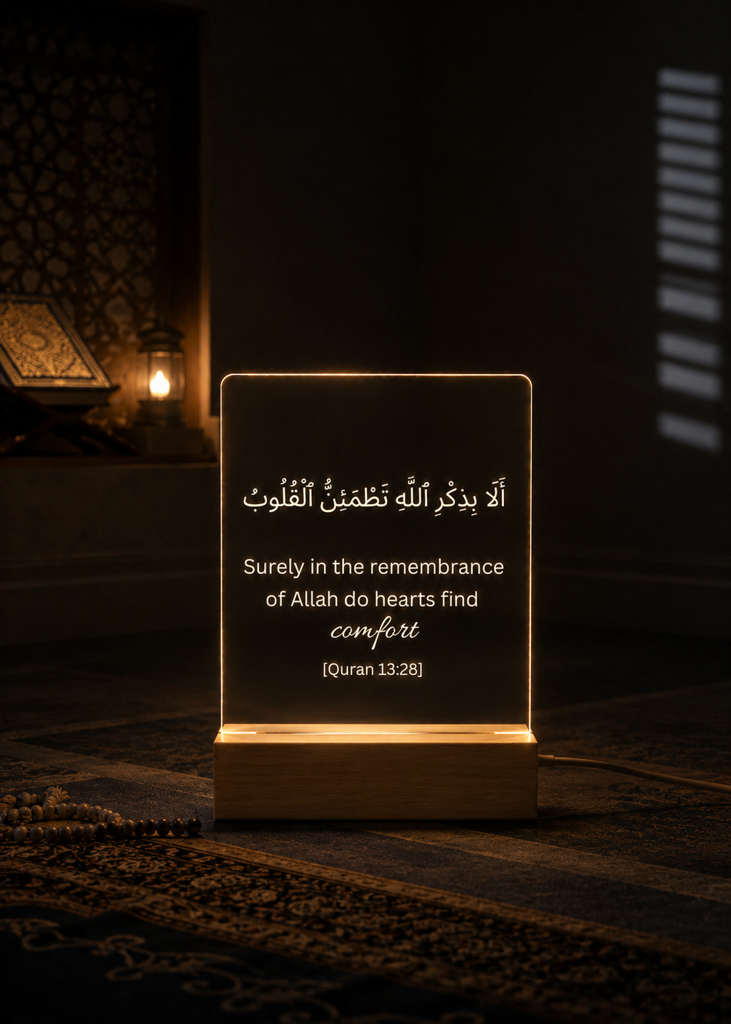 Lighted sign with Arabic text and English translation on a dark background